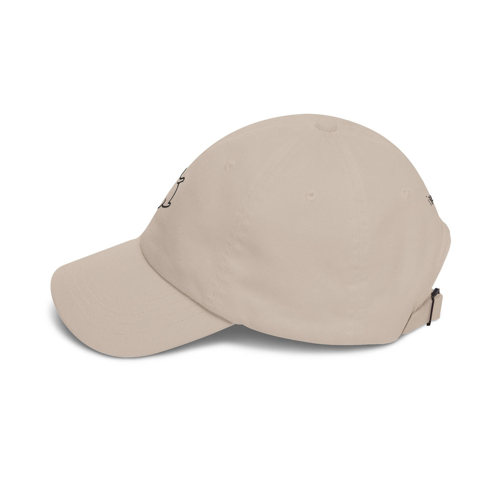 TUCURUCU beige 6-panel cotton cap with a relaxed low-profile fit and embroidered character detail.